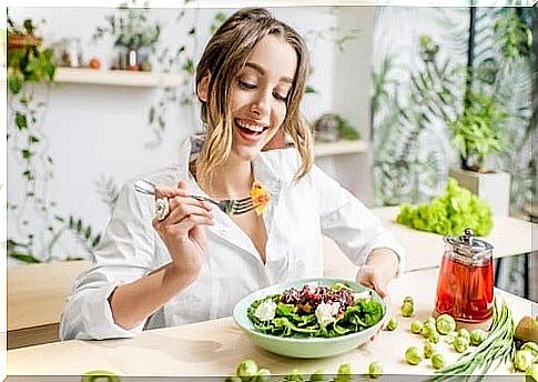 Woman eating a salad