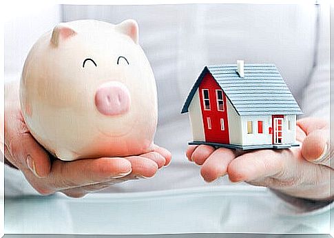 A piggy bank and a house, and saving