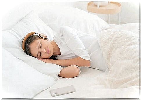 Sleeping woman in headphones