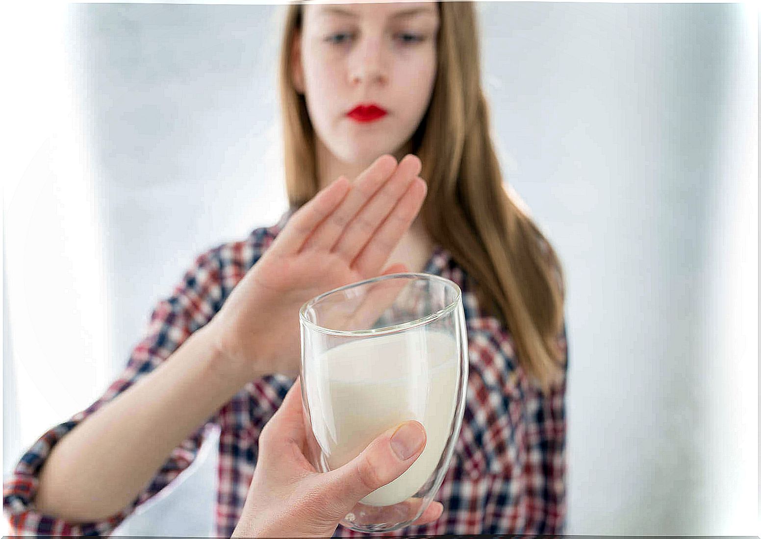 Woman refusing milk