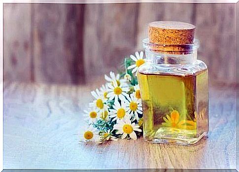 Chamomile infusion in a glass jar 