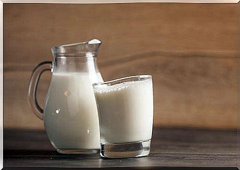 milk in a glass and a jug